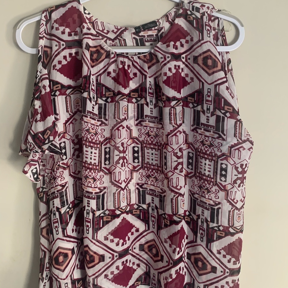 Burgundy, black, and white blouse